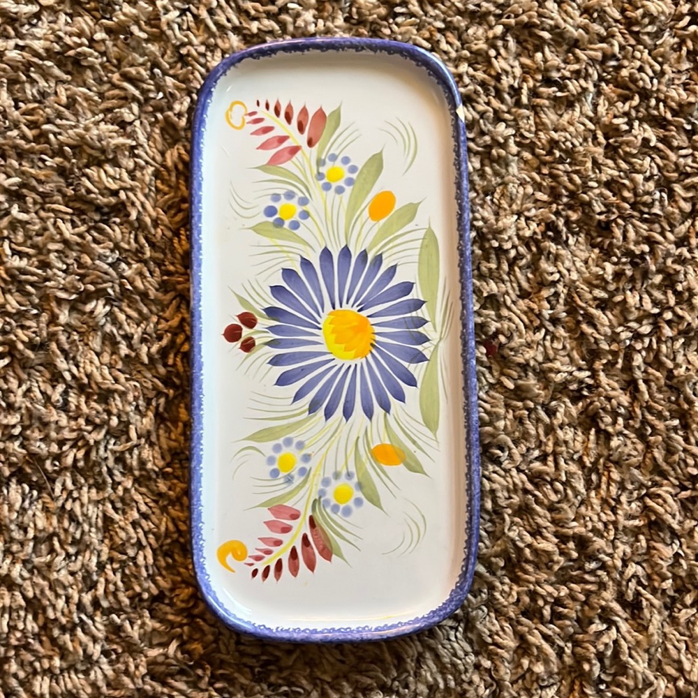 Cute tray or spoon holder, one chip on the side.